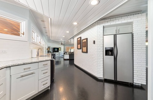 Grove House | Lakefront Home with Boat Slips, Free Pool Access and On-Site Boat Rental