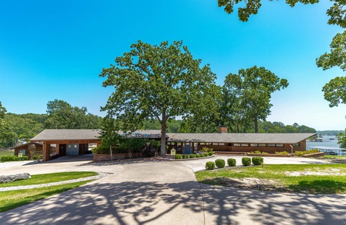 Grove House | Lakefront Home with Boat Slips, Free Pool Access and On-Site Boat Rental