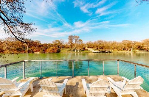McQueeney House | Lakefront home with hot tub, dock, kayaks, central AC, & great lake views