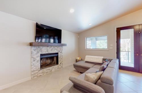 McQueeney House | Lakefront home with hot tub, dock, kayaks, central AC, & great lake views