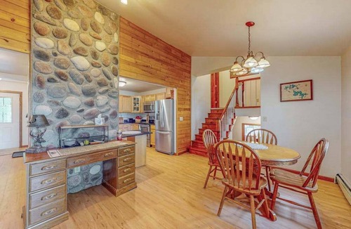 Arbor Vitae House | Lakefront home with large patio, fire pit, W/D & WIFI