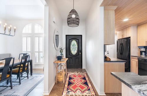 Tool House | Lakefront home with luxury touches. Ample outdoor space for making memories.