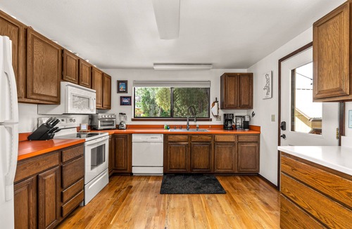 Big Arm House | Lakefront home with private beach, dock, firepit, & grill - dazzling sunset view