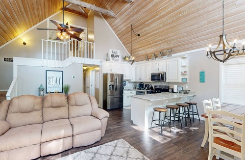 Eatonton Cabin | Lakefront home with two boat slips, lake views, firepit, grill, deck, & 2 kayaks