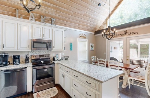 Eatonton Cabin | Lakefront home with two boat slips, lake views, firepit, grill, deck, & 2 kayaks