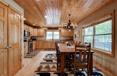 Eagle River House | Lakefront home with private dock, firepit, playground & lake views