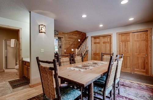 Eagle River House | Lakefront home with private dock, firepit, playground & lake views