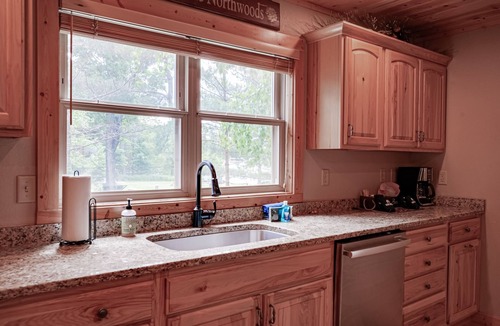 Eagle River House | Lakefront home with private dock, firepit, playground & lake views