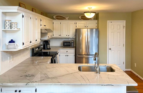Eatonton Cottage | Lakefront House with Private Dock + Fire Pit!