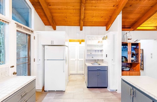 Otis House | Lakefront house with private dock firepit and sunset views