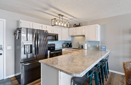 Osage Beach Condo | Lakefront - King Bed - No Stairs - Salt Water Pool - Putting Green - Views