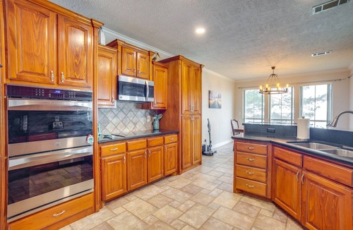 West Livingston House | Lakefront Livingston Vacation Rental w/ Boat Dock!
