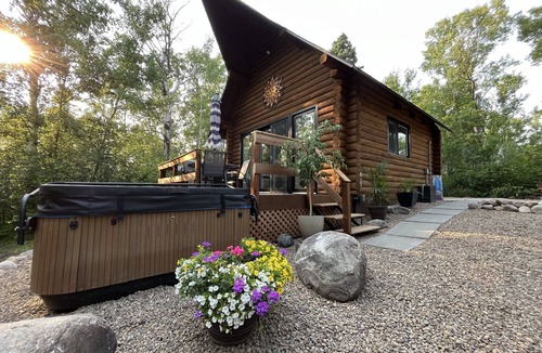 Onanole Cottage | Lakefront Log Cabin with HOT TUB. Unique property with private lake access.