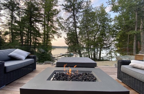Dysart et al Cottage | Lakefront Luxury-Glass cottage, level lot, large dock, hot tub, private!