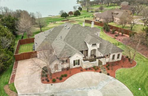 Wylie House | Lakefront Mansion with Pool and Cinema