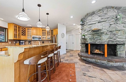 Saunders Lake House | Lakefront Octagon Hot Tub Wine Bar Game Room