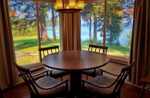 Sodus House | Lakefront Pine Cottage Hot Tub & Fire Pit