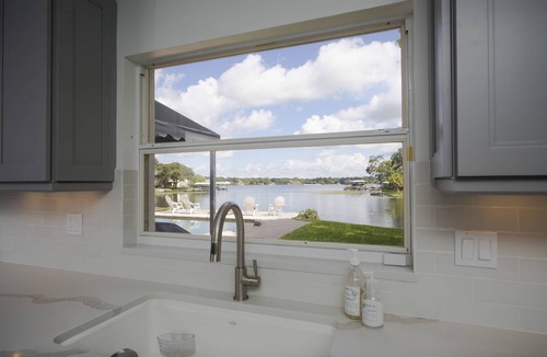 Carrollwood House | Lakefront Pool Home w/Game Room, Epic View, Kayaking