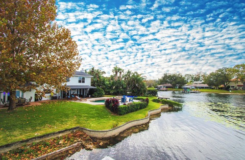 Carrollwood House | Lakefront Pool Home w/Game Room, Epic View, Kayaking