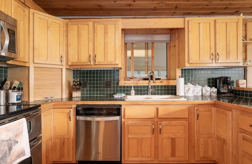 Grand Lake Cabin | Lakefront! - Private Hot Tub - Situated Directly on Grand Lake w/Boat Dock