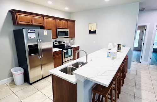 Grove House | Lakefront Resort Townhome with Swimming Pool and Boat Slips On Site