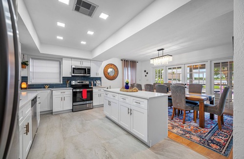 On Top of The World House | Lakefront retreat - Heated Pool - 8 miles to Clearwater beach