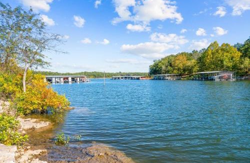 Golden House | Lakefront Retreat with Deck Movie Room and Yard