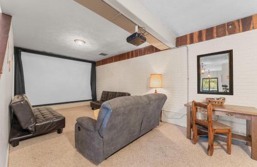 Golden House | Lakefront Retreat with Deck Movie Room and Yard
