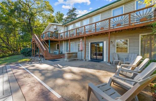 Golden House | Lakefront Retreat with Deck Movie Room and Yard