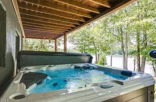 Leasburg House | Lakefront Retreat with Hot Tub + Fire Pit + Water Views at Hyco Lake