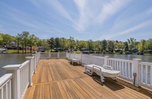 Wise House | Lakefront Retreat with Hot Tub, 2 Docks, Panoramic Views, Firepit, SUP & Kayaks