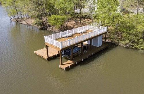 Wise House | Lakefront Retreat with Hot Tub, 2 Docks, Panoramic Views, Firepit, SUP & Kayaks