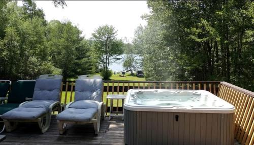 Woodridge House | Lakefront Retreat with Hot Tub, Dock & Firepit Views in Woodridge, New York