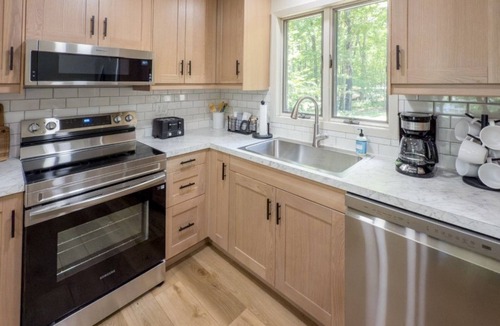 Iron River Cabin | Lakefront Stay w/Direct Snowmobile Trail Access