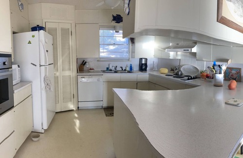 Sunrise Beach Village House | Lakefront retreat on quiet cove with large deck and sweeping views.
