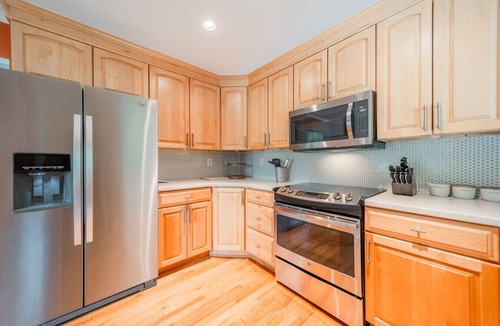 Mayhew House | Lakefront Vacation Oasis w/Hot Tub, Beach, Pets OK