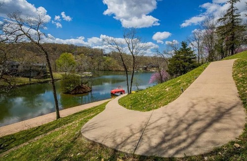 Bella Vista House | Lakefront w/Hot Tub/Dock/2 Min to OZ Trails Bike Park/Backyard Trail Access