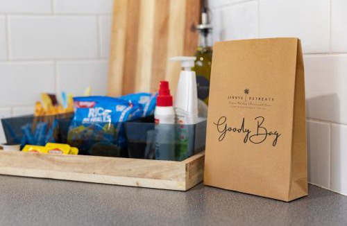 Kingfisher Shores House | Lakeshore Cottage - Boho Chic with Poolside Deck