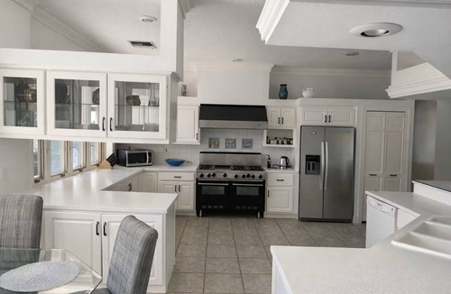 Clermont House | Lakeshore Sunset Home with Heated Pool & Beachfront