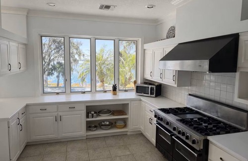 Clermont House | Lakeshore Sunset Home with Heated Pool & Beachfront