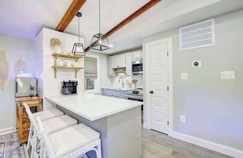 Chesapeake Ranch Estates-Drum Point Cabin | Lakeside Cabin - Hot Tub, Firepit, Kayak, Arcade