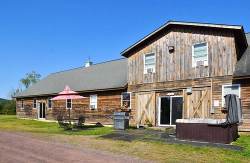 Hancock House | Lakeside Gem: Hot Tub & Game Room in Hancock