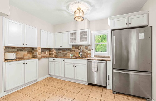 Marietta House | Lakeside Home w Pool, Arcade, Theater, Fenced Yard