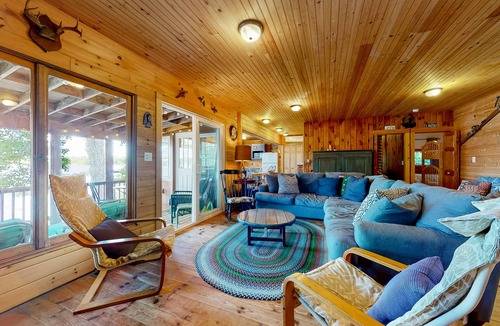 The Bays Cabin | Lakeside home with private dock, firepit, grill, scenic balcony, fireplace & AC