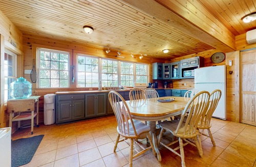 The Bays Cabin | Lakeside home with private dock, firepit, grill, scenic balcony, fireplace & AC