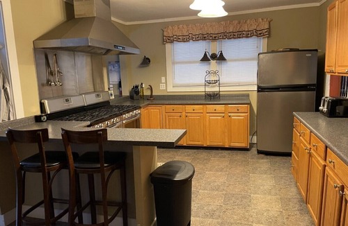 Long Lake Cabin | Lakeside Lodge- Wraparound Deck & Private Sandy Beach with Floating Dock