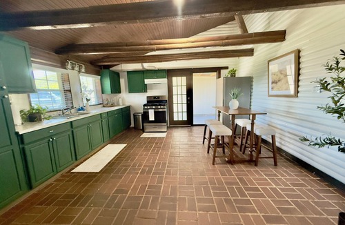 Flour Bluff Cabin | Lakeside Log Cabin Retreat- Close to Beach + Fishing + Boat Parking