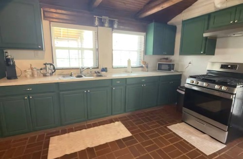 Flour Bluff Cabin | Lakeside Log Cabin Retreat- Close to Beach + Fishing + Boat Parking