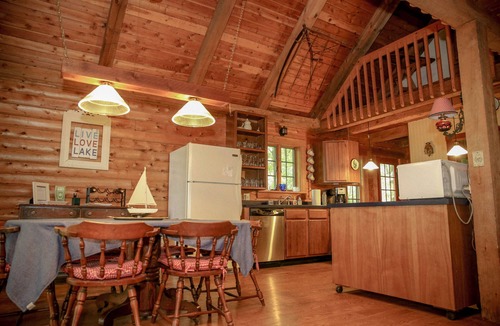 Town of Torrey Cabin | Lakeside Log Cabin with cozy stone fireplace