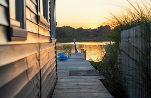 Alto Cottage | Lakeside Retreat Near Grand Rapids: Private Dock, Kayaks & Sunset Views